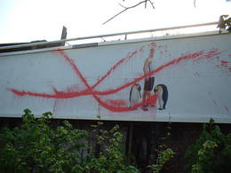 vandalised advert david beckham clear channel water pistol red paint united kingdom